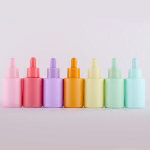 Essential oil serum pink cosmetic dropper bottle